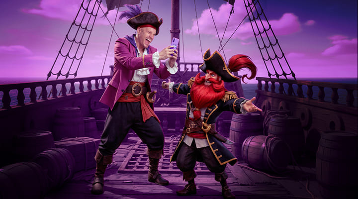 FACUNDO ARRIBA DE UN BARCO PIRATA JUGANDO EN SU TELEFONO EN PLAYUZU MIENTRAS ENFRENTE D EL SE ENCUENTRA UN PERSONAJE DE. ELSLOT