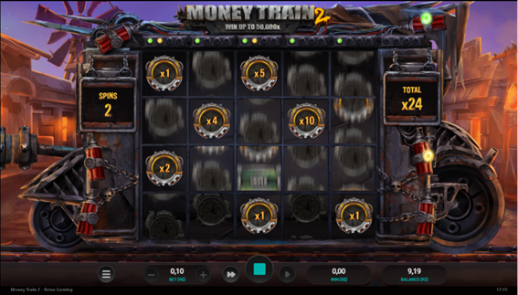 Tela do b&ocirc;nus Money Cart no Money Train 2 mostrando a grade com rolos girando, s&iacute;mbolos multiplicadores fixos, contador de spins restantes &agrave; esquerda e total acumulado de x24 &agrave; direita. 