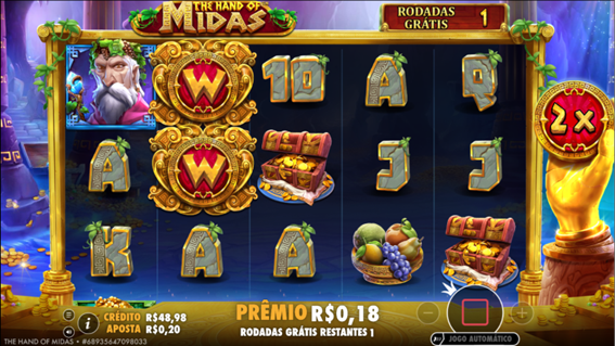 Rodadas grátis de The Hand of Midas slot com wilds sticky e multiplicador   Tela das rodadas grátis do slot The Hand of Midas exibindo dois wilds fixos na grade e o símbolo com o multiplicador aplicado.