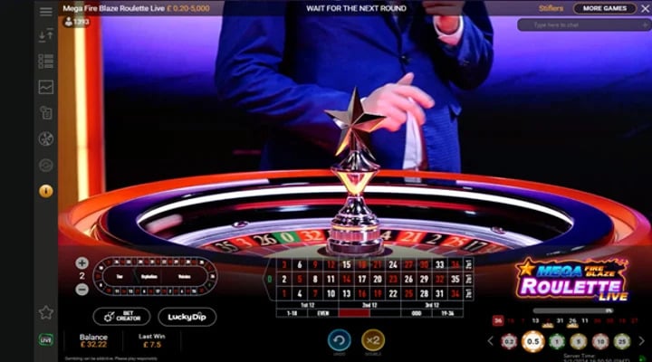 A host runs a game of Mega Fire Blaze Roulette Live from Playtechv